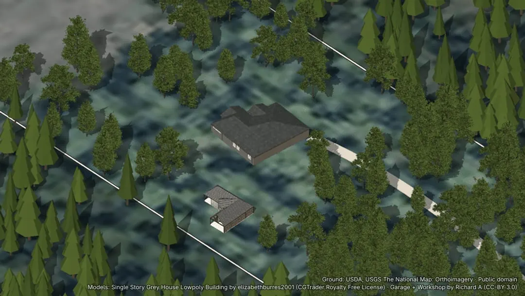 A house and a shop on a timbered homesite, the ground cleared close in and the trees thinned beyond it.